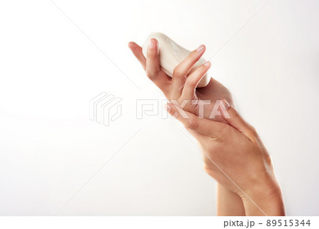 Beauty begins with cleansing. Closeup studio shot of a womans hands holding a bar of soap. 89515344