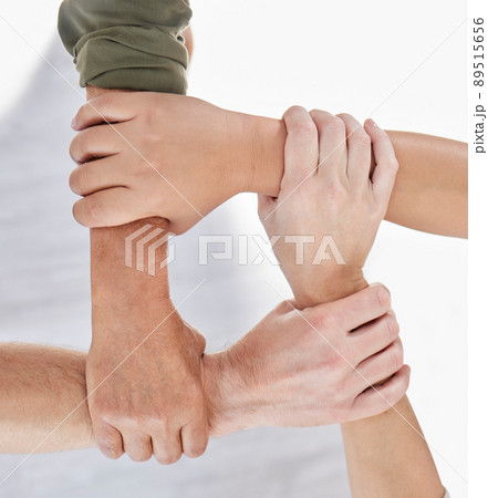 Be a source of strength for your team. Shot of a group of colleagues holding arms. Be a source of strength for your team. Shot of a group of colleagues holding arms. 89515656