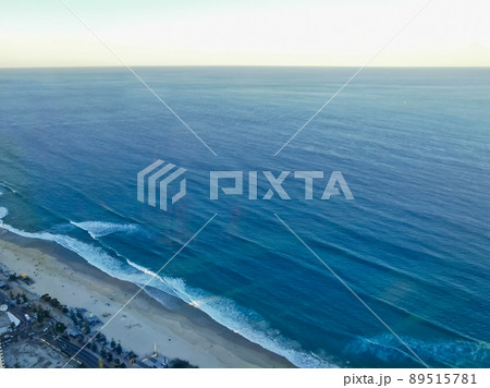 Aerial panorama view of Surfer Paradise beach and Pacific ocean landscape with Sunset light in the evening. Aerial panorama view of Surfer Paradise beach and Pacific ocean landscape with Sunset light in the evening. 89515781