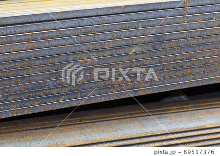 Metal profiles of different kinds are located in the metal products warehouse Metal profiles of different kinds are located in the metal products warehouse 89517376