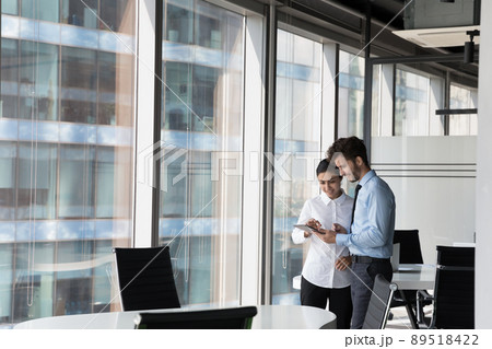Two happy diverse coworker employees discussing online presentation 89518422