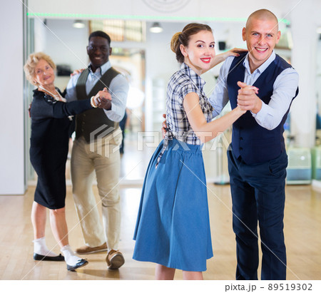 Adult dancing couple enjoying active swing 89519302