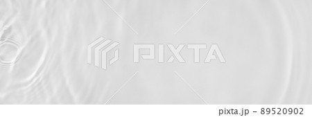Water texture with sun reflections on the water overlay effect for photo or mockup. Organic light gray drop shadow caustic effect with wave refraction of light. Long banner with copy space. 89520902