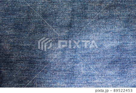 Jeans,Blue jean fabric texture background,Classic Jeans Texture of blue jeans textile close up. Blue color of denim texture with copy space for advertise or vintage background. 89522453