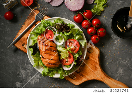 Healthy food. Grilled chicken breast with salad vegetables 89525741