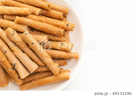 crispy coconut roll on plate crispy coconut roll on plate 89533296