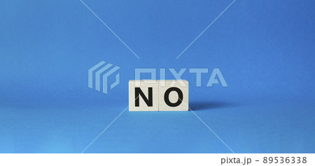 No symbol. Concept words No on wooden blocks. Beautiful blue background. Business and No concept. Copy space. No symbol. Concept words No on wooden blocks. Beautiful blue background. Business and No concept. Copy space. 89536338