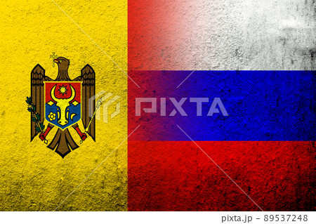 National flag of Russian Federation with The Republic of Moldova National flag. Grunge background National flag of Russian Federation with The Republic of Moldova National flag. Grunge background 89537248