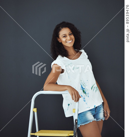 Happiness is being able to express creativity. Portrait of an attractive young female painter in the studio. Happiness is being able to express creativity. Portrait of an attractive young female painter in the studio. 89539476