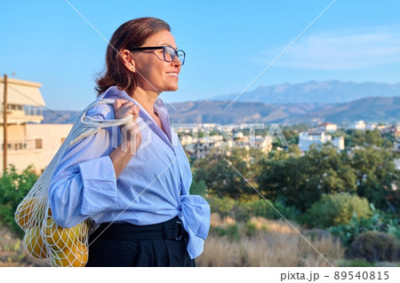 Happy calm woman enjoying vacation in nature, profile view 89540815