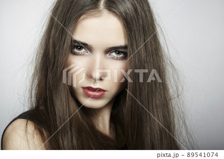 Fashion portrait of young beautiful woman. Close-up Fashion portrait of young beautiful woman. Close-up 89541074