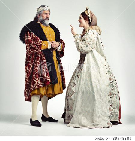 I don't care who you are. Studio shot of a king and queen arguing. I don't care who you are. Studio shot of a king and queen arguing. 89548389