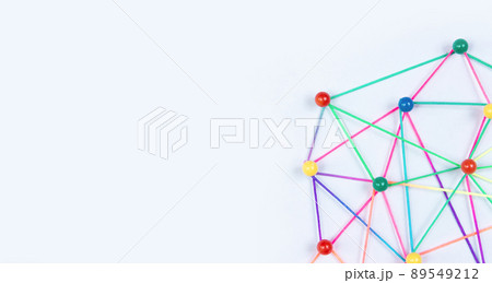 Linking entities, Blockchain, social media, Communications Network, The connection between the two networks. Network simulation on paper linked together by yarn Linking entities, Blockchain, social media, Communications Network, The connection between the two networks. Network simulation on paper linked together by yarn 89549212