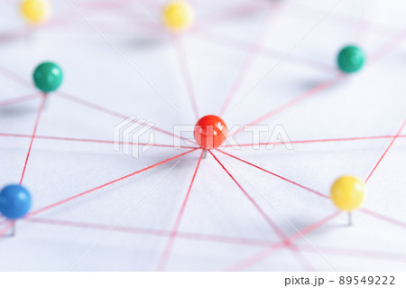 Linking entities, Blockchain, social media, Communications Network, The connection between the two networks. Network simulation on paper linked together by yarn 89549222