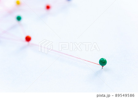 Linking entities, Blockchain, social media, Communications Network, The connection between the two networks. Network simulation on paper linked together by yarn Linking entities, Blockchain, social media, Communications Network, The connection between the two networks. Network simulation on paper linked together by yarn 89549586