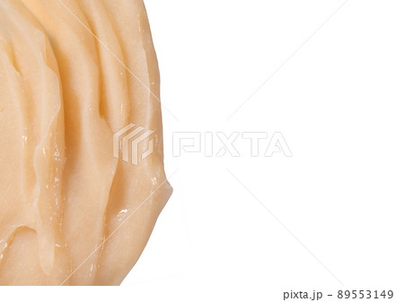 Hair conditioner cream swatch smear on white background. Yellow cosmetic lotion moisturiser sample closeup. Body care balm, retinol serum, shampoo wavy texture. Skincare mask, creamy cleanser Hair conditioner cream swatch smear on white background. Yellow cosmetic lotion moisturiser sample closeup. Body care balm, retinol serum, shampoo wavy texture. Skincare mask, creamy cleanser 89553149
