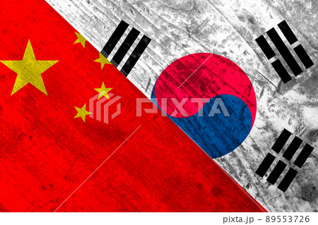 Flags of China and South Korea on a wooden surface. 89553726