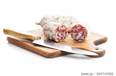 Traditional sausage with white mold. Dried pork salami isolated on white background. 89554568