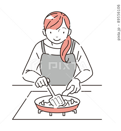 コンロのフライパンで食材を炒める女性 89556106