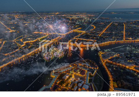 Festive salute over the Peter and Paul Fortress in a significant Victory Day for the country on May 9, improbable quantity of ships observes a show, an eternal flame of memory burns on rostral colons 89561971