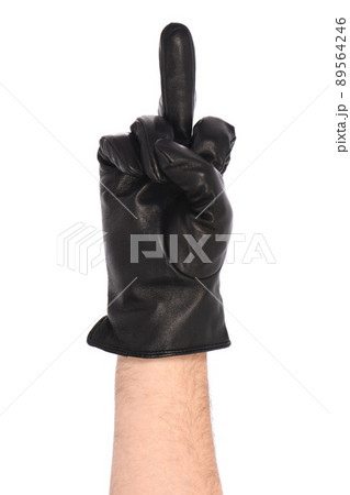 Man wearing black leather glove on white background, closeup. Middle finger up. (Fuck you) Man wearing black leather glove on white background, closeup. Middle finger up. (Fuck you) 89564246