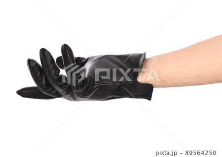 Man wearing black leather glove on white background, closeup. 89564250