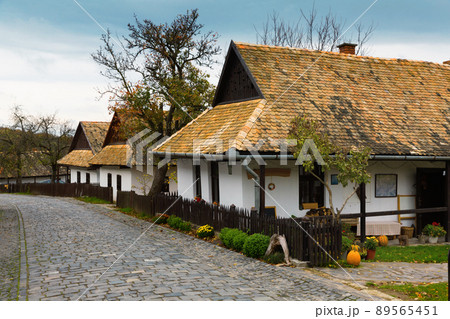 Illustration of view on the streets of traditional hungarian village Holloke 89565451