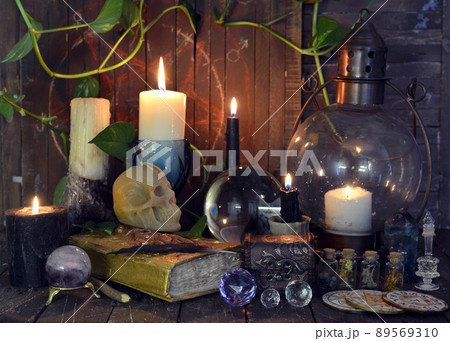 Wicca, esoteric and occult still life with vintage magic objects on witch table altar for mystic rituals and fortune telling. Halloween and gothic concept 89569310