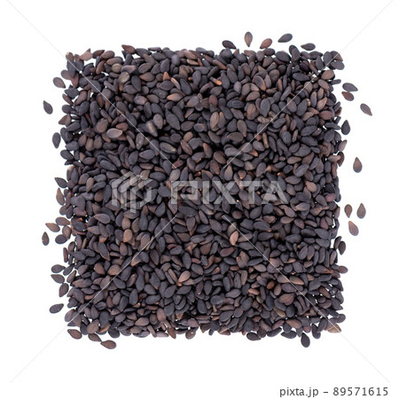 Black sesame seeds isolated on white background. Organic spice. Top view. Black sesame seeds isolated on white background. Organic spice. Top view. 89571615