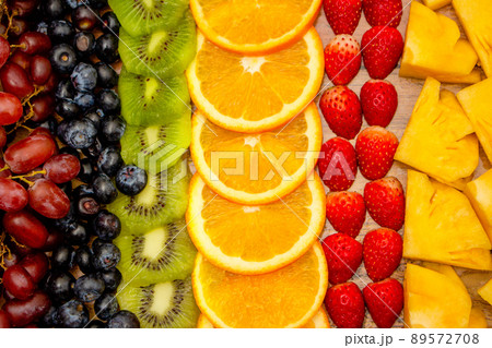 Fresh fruits concept, Arrangement in row of colorful fruits healthy as background Fresh fruits concept, Arrangement in row of colorful fruits healthy as background 89572708