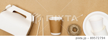 Eco friendly concept, Delivery food container and paper cup with jute rope on wooden background Eco friendly concept, Delivery food container and paper cup with jute rope on wooden background 89572794