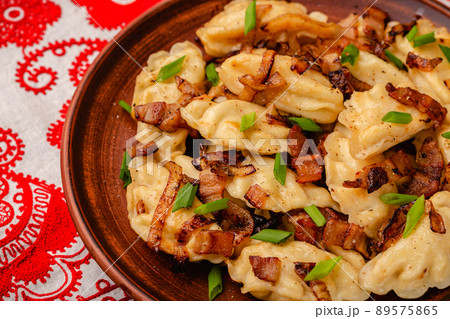 Dumplings, filled with mashed potatoes. 89575865