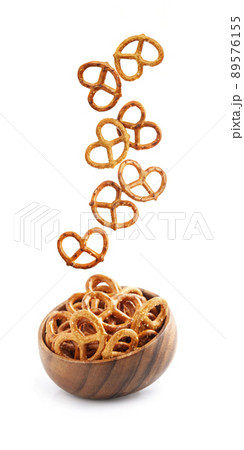 Falling cookie on white backgrounds Falling cookie on white backgrounds 89576155