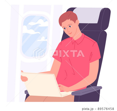 Man with laptop on aircraft during flight Man with laptop on aircraft during flight 89576458