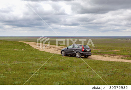 Honda CRV car in the steppe. Republic of Kalmykia. Russia 89576986