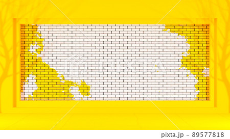 Brick wall yellow and white in the frame and shadow of the tree. 89577818