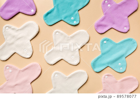 Eco-friendly reusable fabric women's pads. set of colorful bright reusable menstrual pads. zero waste woman periods concept top view with copy space 89578077