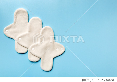Eco-friendly reusable fabric women's pads. set of colorful bright reusable menstrual pads. zero waste woman periods concept top view with copy space 89578078