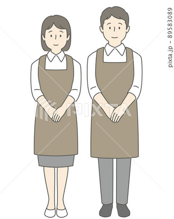 笑顔で立つエプロン姿の男女 89583089