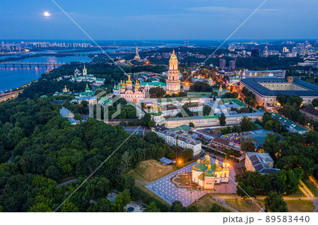 Beautiful summer top view of the Kiev-Pechersk Lavra. Many churches. Beautiful panorama of Kiev in the evening. 89583440