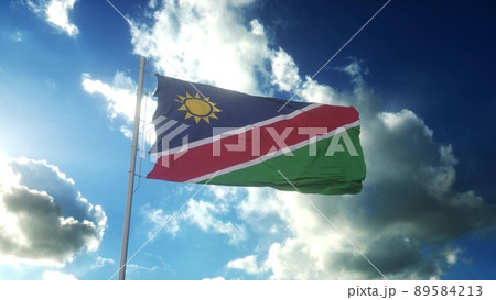 Flag of Namibia waving at wind against beautiful blue sky. 3d rendering 89584213
