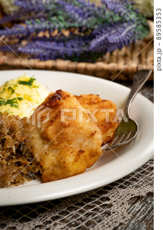 Fried cod fillet . 89585353