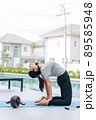 Happy asian woman stretching exercise and yoga workout in the morning at home Happy asian woman stretching exercise and yoga workout in the morning at home 89585948