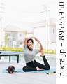 Happy asian woman stretching exercise and yoga workout in the morning at home Happy asian woman stretching exercise and yoga workout in the morning at home 89585950