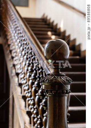 Wooden old decorative balusters, Ancient wooden stairs. decorative railings carved from wood 89586808