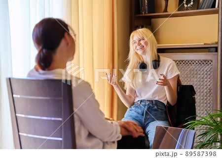 Teenage female in therapy session in psychologist's office 89587398