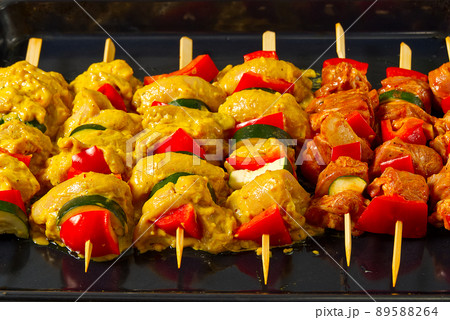raw marinated meat on wooden skewers, pork, chicken, beef raw marinated meat on wooden skewers, pork, chicken, beef 89588264