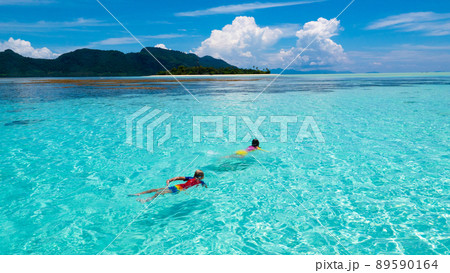 Kids snorkel. Children snorkeling in tropical sea. 89590164
