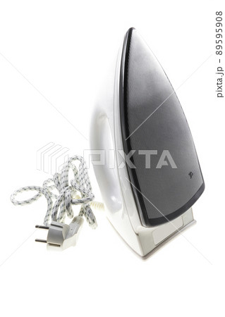 white electric iron on a white background. 89595908
