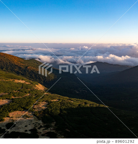 Photo of the Carpathians from a bird's eye view, drone flying over the mountains. 89601292
